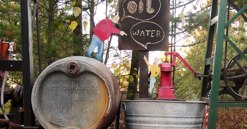 Tom Lakenen Sculpture Money Priceless Oil Water