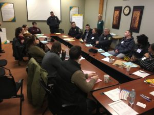 Syracuse Police Department and Peacemaking Center meet to plan the audit.