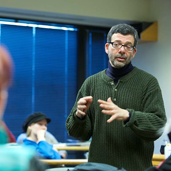 John Burdick teaching students