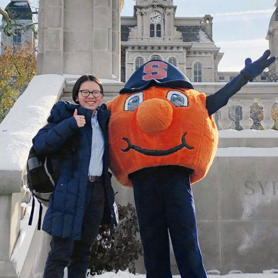 Maxwell student Lia Chabot with Otto the Orange