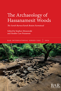 Cover of the book "The Archaeology of Hassanamesit Woods: The Sarah Burnee/Sarah Boston Farmstead," edited by Stephen Mrozowski and Heather Law Pezzarossi, featuring an archaeological site with scattered stones among forested area.