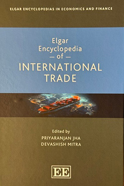 Cover of the "Elgar Encyclopedia of International Trade," edited by Priyaranjan Jha and Devashish Mitra. It features a cargo ship image against a blue and black background.