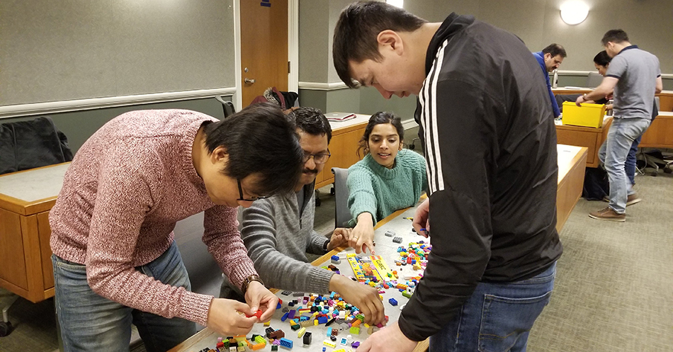 Collaborative governance students work collaboratively to build a Lego city