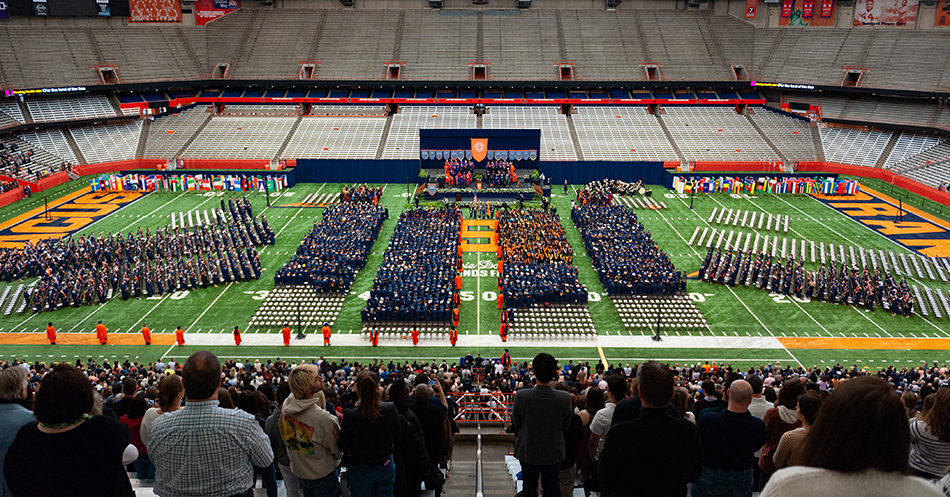 Students sitting at commencement in the Dome