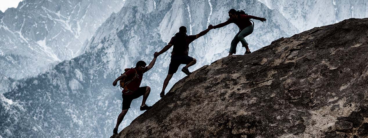 Collaboration to climb mountain
