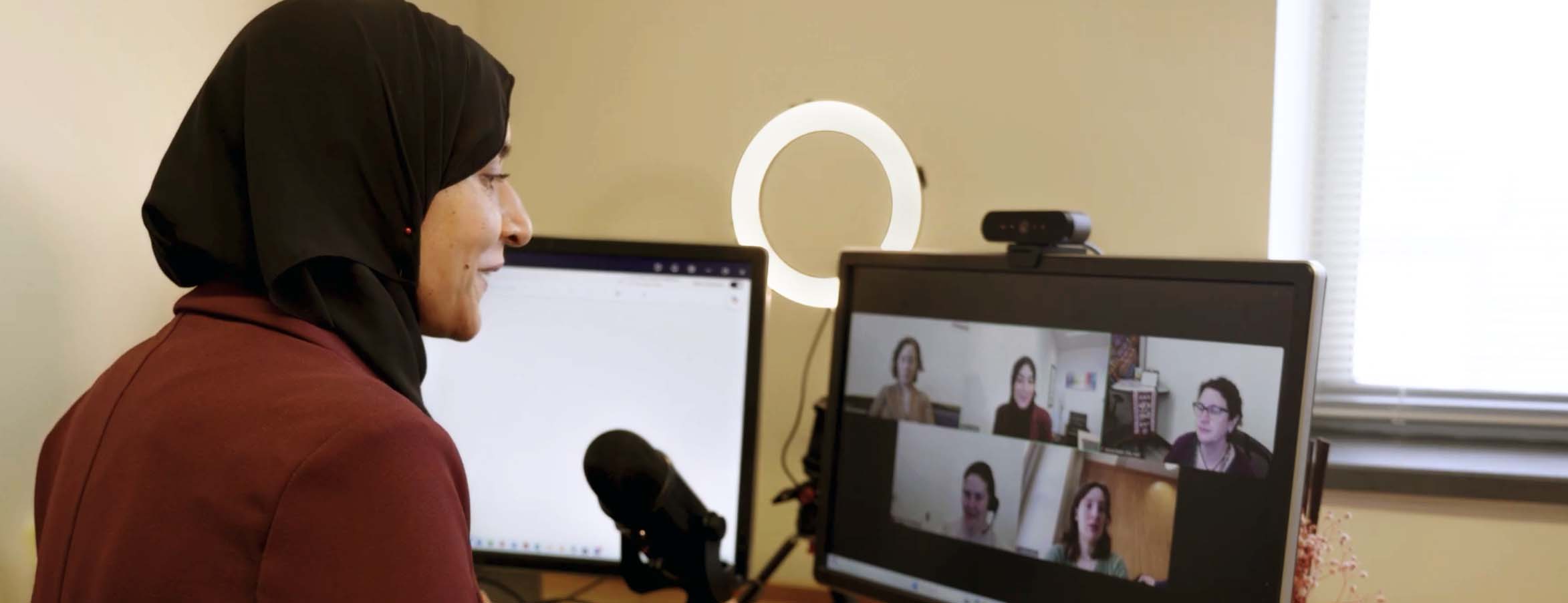Professor Saba Siddiki teaching an online course to students