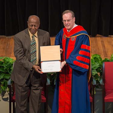 Alumnus Charles Willie is shown with Chancellor Kent Syverud