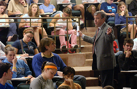Bob McClure lecturing to a class in Maxwell auditorium