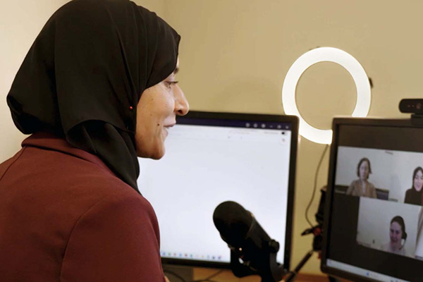Professor Saba Siddiki teaching an online course to students.