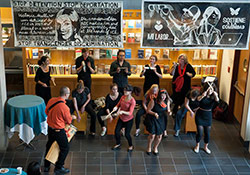 A Brazilian music ensemble performing at an art exhibition in Eggers Hall