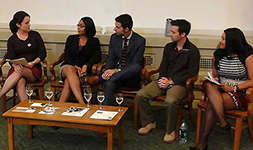 Teach for America volunteers on a panel reflecting on their service