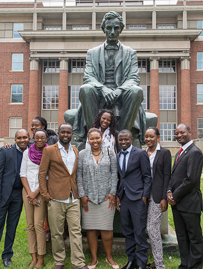 Mandela Washington Fellows posing in front of the Lincoln statue on the quad