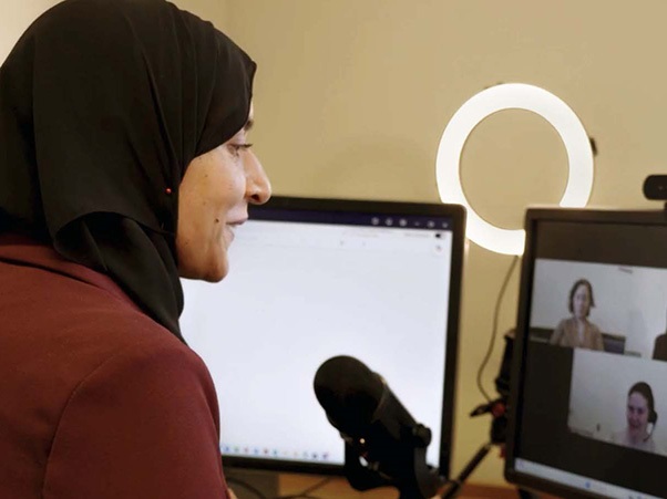 Professor Saba Siddiki teaching an online course to students.