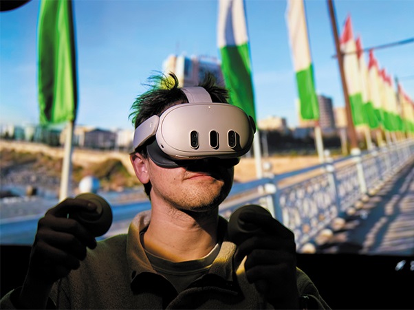 A student wearing a virtual reality headset