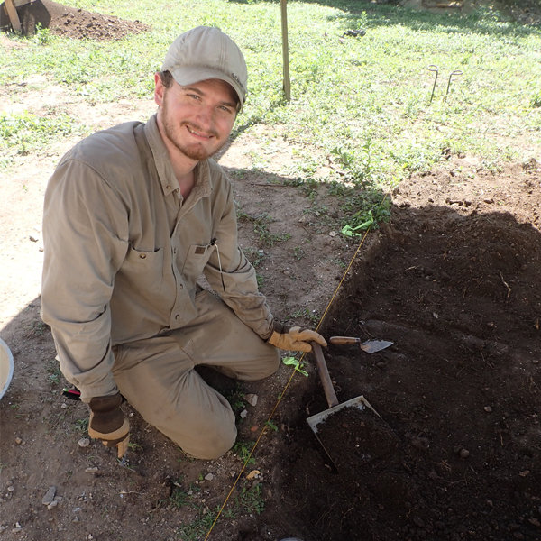 Matthew O'Leary at an excavation site