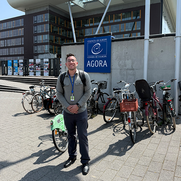 Alejandro Parra standing in front of the Council of Europe